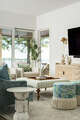 Seidl deftly mixes prints on upholstered pieces in the living room.