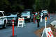 National Park Service ranger Kate Trust walks on a lane used for pedestrians as vehicles use another lane at Yosemite National Park in February.
