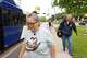 Araceli Campos (left) must walk a little over 20 minutes to her work in Highland Park after the Dallas Area Rapid Transit (DART) 237 bus drops her off at Preston @ Normandy in University Park on Friday, May 15, 2026. Highland Park residents voted to leave DART in May 2026 after spending more than 40 years as part of the transit network.