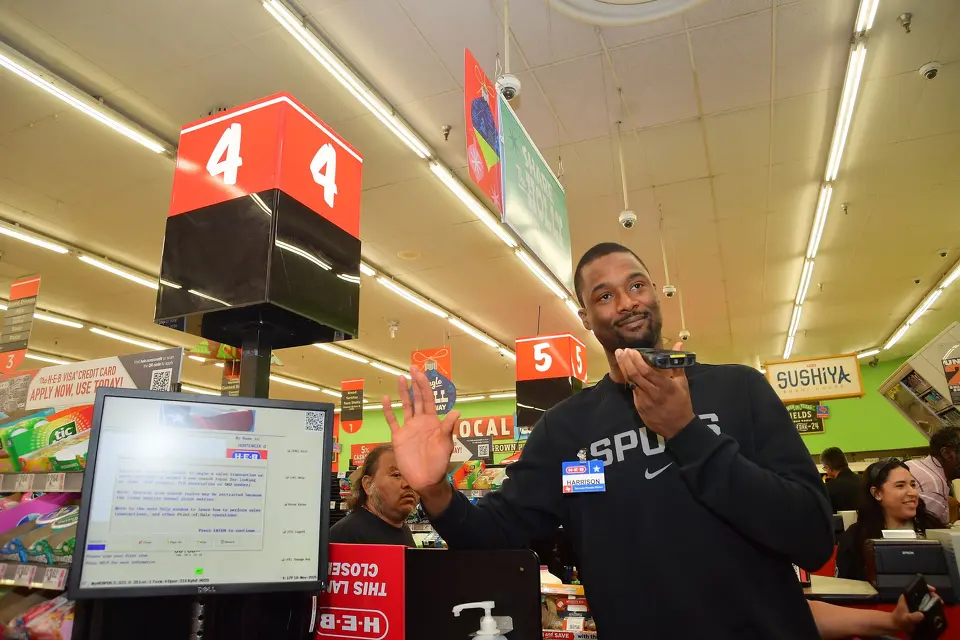 San Antonio Spurs forward Harrison Barnes buys groceries for people while hosting a holiday shopping spree for families at H-E-B in San Antonio, Texas, on November 20, 2025.