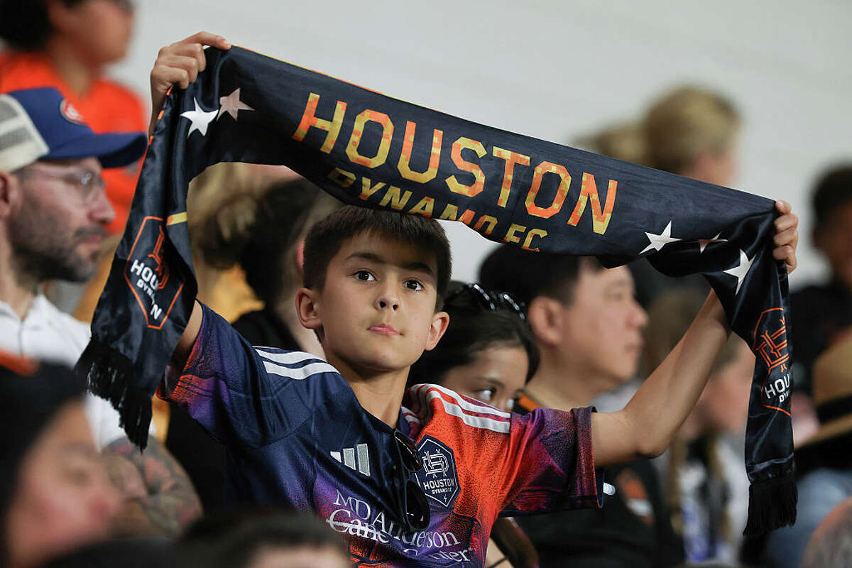 HOUSTON, TEXAS - MAY 02: A Houston Dynamo FC fan displays a scarf during second half against the Colorado Rapids at Shell Energy Stadium on May 02, 2026 in Houston, Texas. (Photo by Jack Gorman/Getty Images)