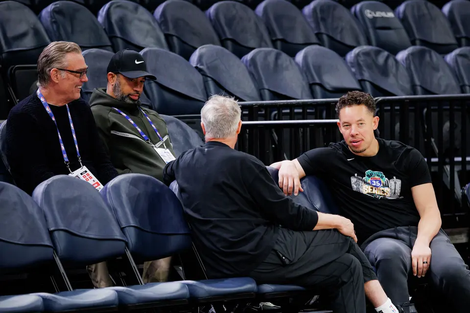 San Antonio Spurs chief executive RC Buford, from left, general manager Brian Wright and head coach Mitch Johnson talk as the team participates in shootaround to prepare for game six of the Western Conference semifinals against the Minnesota Timberwolves at Target Center in Minneapolis, Friday, May 15, 2026.