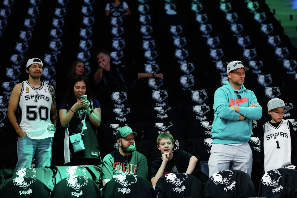 San Antonio Spurs fans watch the team warm up before Game 6 of the Western Conference semifinals against the Minnesota Timberwolves at Target Center in Minneapolis, Friday, May 15, 2026.