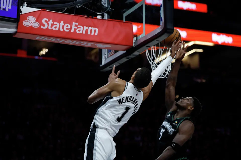 San Antonio Spurs forward Victor Wembanyama (1) gets the layup past Minnesota Timberwolves guard Anthony Edwards (5) during the first half of Game 6 of the Western Conference semifinals at Target Center in Minneapolis, Friday, May 15, 2026.