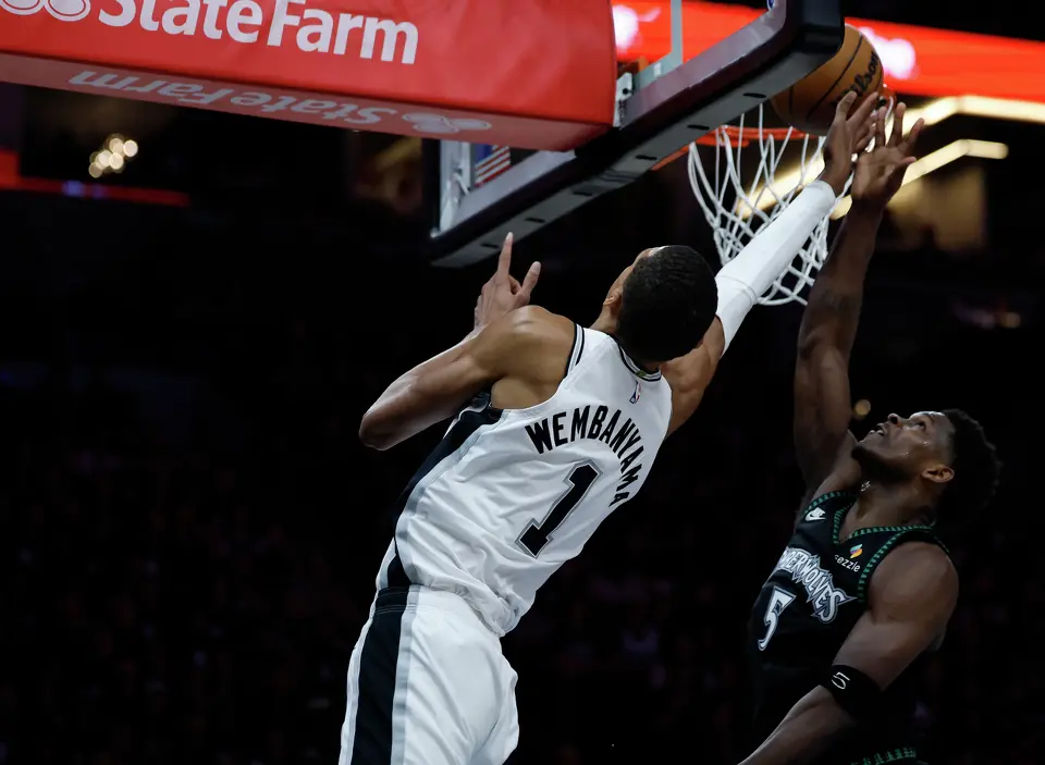 San Antonio Spurs forward Victor Wembanyama (1) gets the layup past Minnesota Timberwolves guard Anthony Edwards (5) during the first half of Game 6 of the Western Conference semifinals at Target Center in Minneapolis, Friday, May 15, 2026.