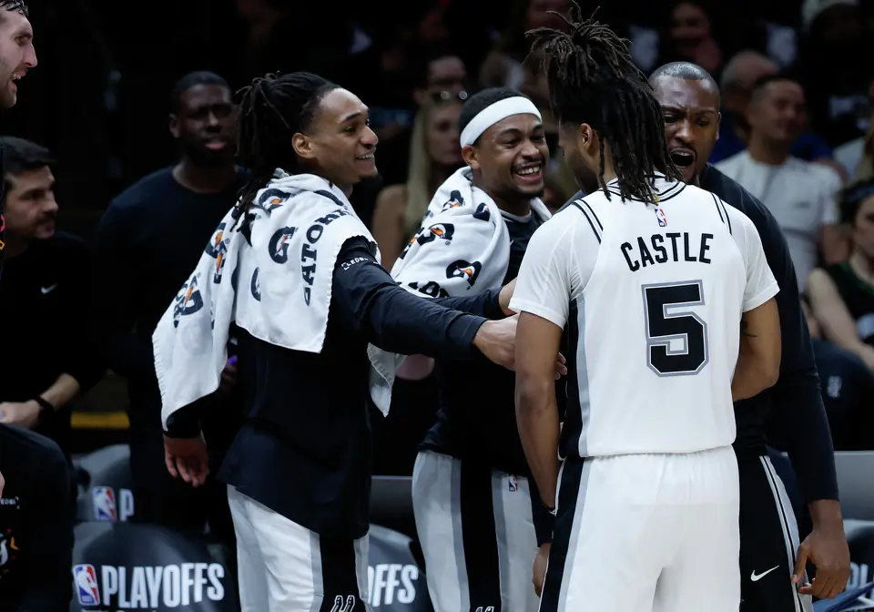 San Antonio Spurs guard Stephon Castle (5) is greeted by his teammates after coming off the floor during the first half of Game 6 of the Western Conference semifinals at Target Center in Minneapolis, Friday, May 15, 2026.