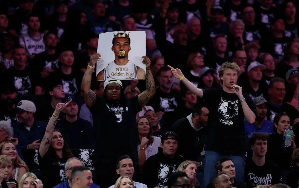 Minnesota Timberwolves fans hold up a sign mocking San Antonio Spurs forward Victor Wembanyama (1) during the first half of Game 6 of the Western Conference semifinals at Target Center in Minneapolis, Friday, May 15, 2026.
