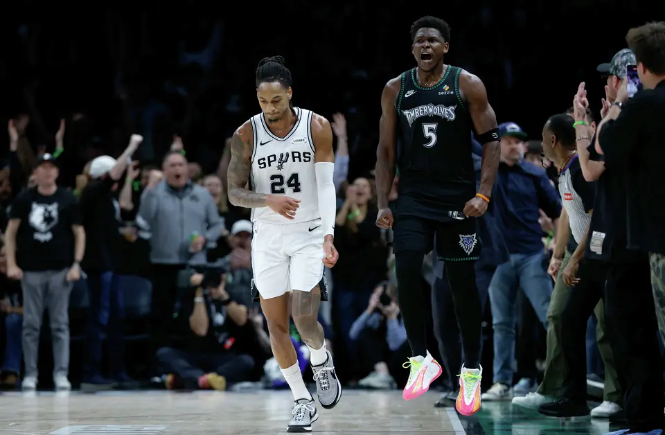 Minnesota Timberwolves guard Anthony Edwards (5) reacts after a big play while next to San Antonio Spurs guard Devin Vassell (24) during the first half of Game 6 of the Western Conference semifinals at Target Center in Minneapolis, Friday, May 15, 2026.