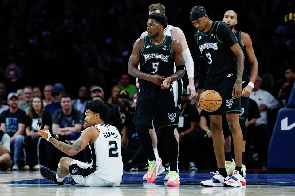 San Antonio Spurs guard Dylan Harper (2) reacts after Minnesota Timberwolves guard Anthony Edwards (5) fouled him during the second half of Game 6 of the Western Conference semifinals at Target Center in Minneapolis, Friday, May 15, 2026. The Spurs defeated the Timberwolves 139-109 and will advance to the Western Conference Finals to face the Oklahoma City Thunder.