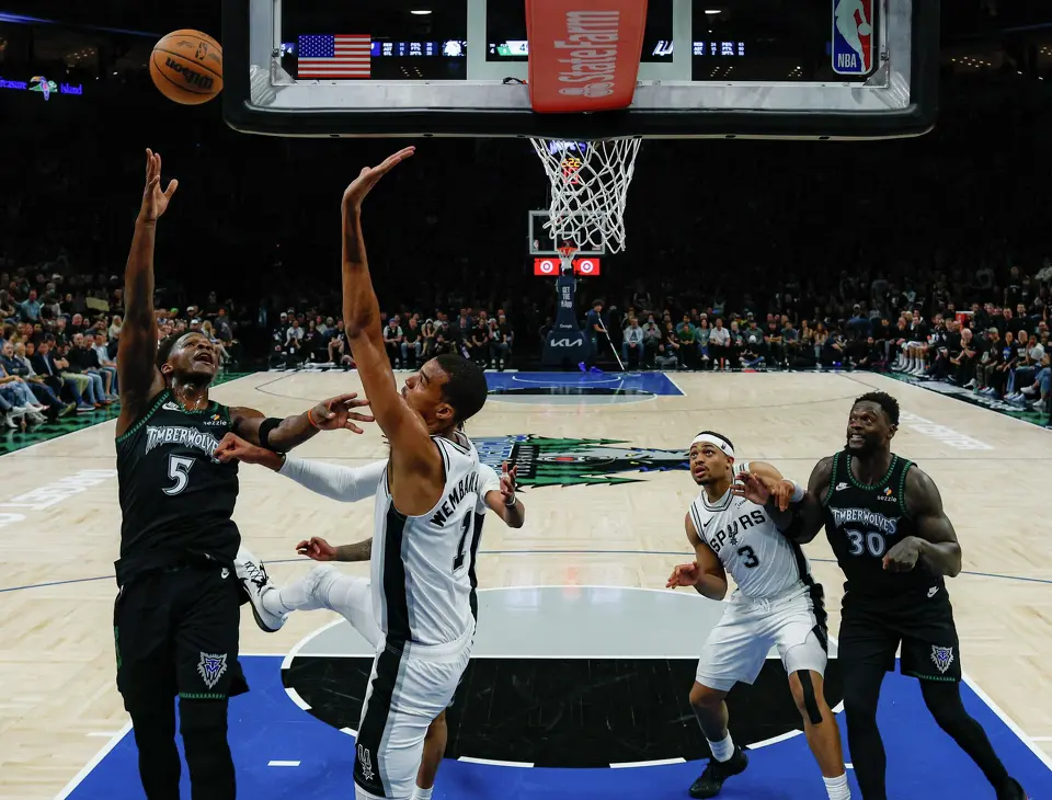 Minnesota Timberwolves guard Anthony Edwards (5) goes up for a shot over San Antonio Spurs forward Victor Wembanyama (1) during the second quarter of Game 6 in the Western Conference semifinals at Target Center in Minneapolis, Friday, May 15, 2026. The Spurs defeated the Timberwolves 139-109 and will advance to the Western Conference Finals to face the Oklahoma City Thunder.