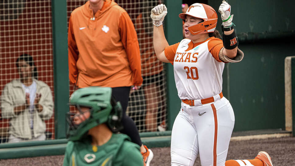 Texas Longhorns infielder Katie Stewart (20) celebrates a home run during the NCAA Softball Championship Regional final against Baylor at Red & Charline McCombs Field on Sunday, May 17, 2026 in Austin.