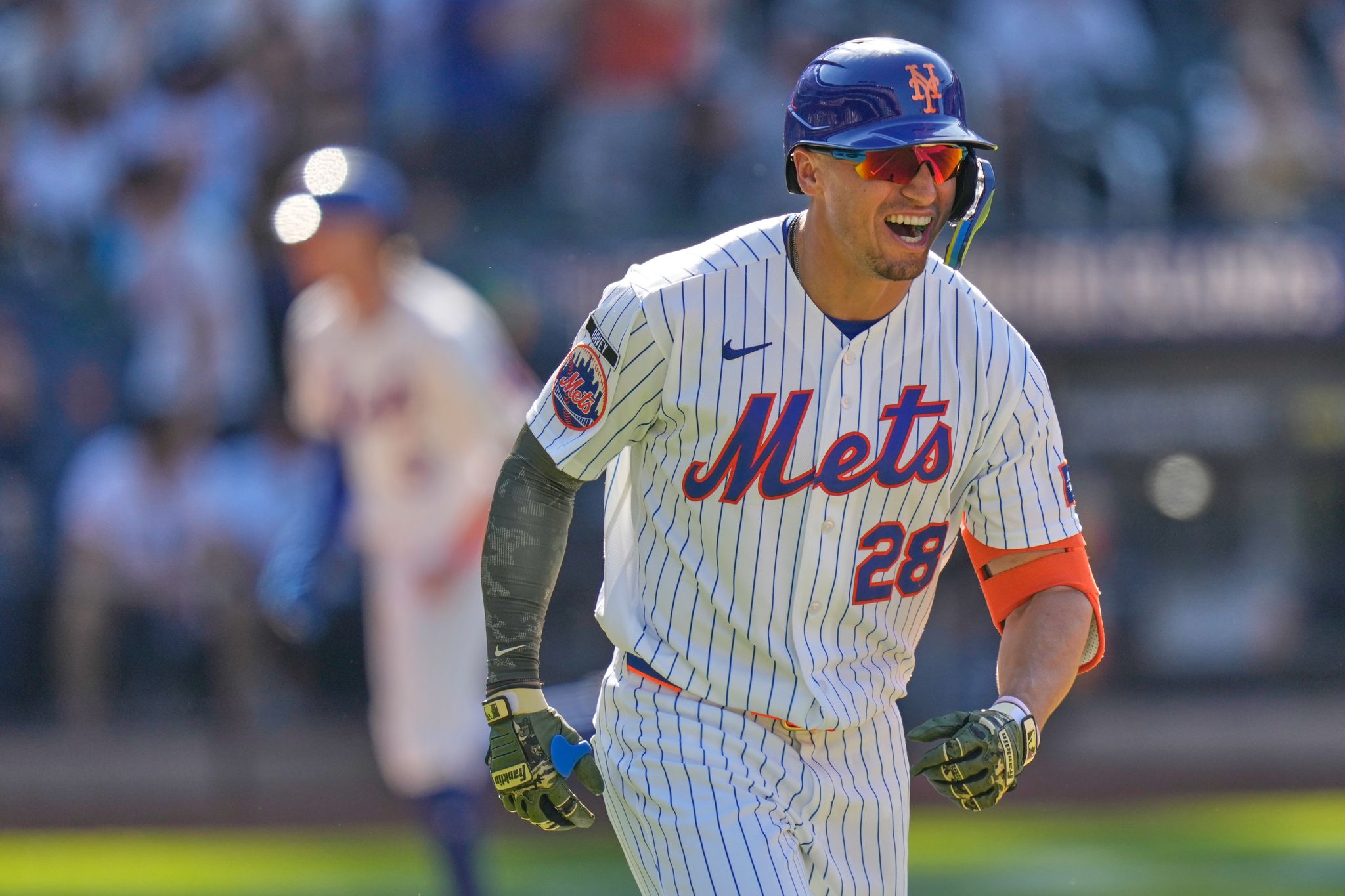 Taylor's 3-run homer in 9th and Benge's bouncer in 10th rally Mets past ...