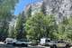 Drivers circle around a parking lot in Yosemite National Park looking for spots Saturday. Many visitors have created unofficial spots since Yosemite ended peak-time reservations.