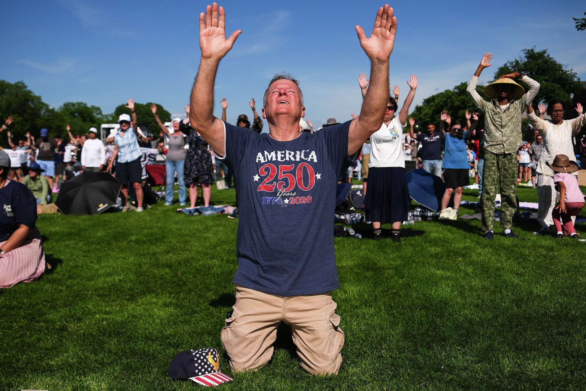 Washington prayer rally draws thousands to the National Mall, in photos