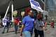 Long Island Rail Road workers walk on the picket line outside of Penn Station on the third day of their strike, Monday, May 18, 2026, in New York.