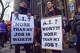 Protesters gather with placards outside OpenAI offices during a march against unregulated artificial intelligence and data centers.