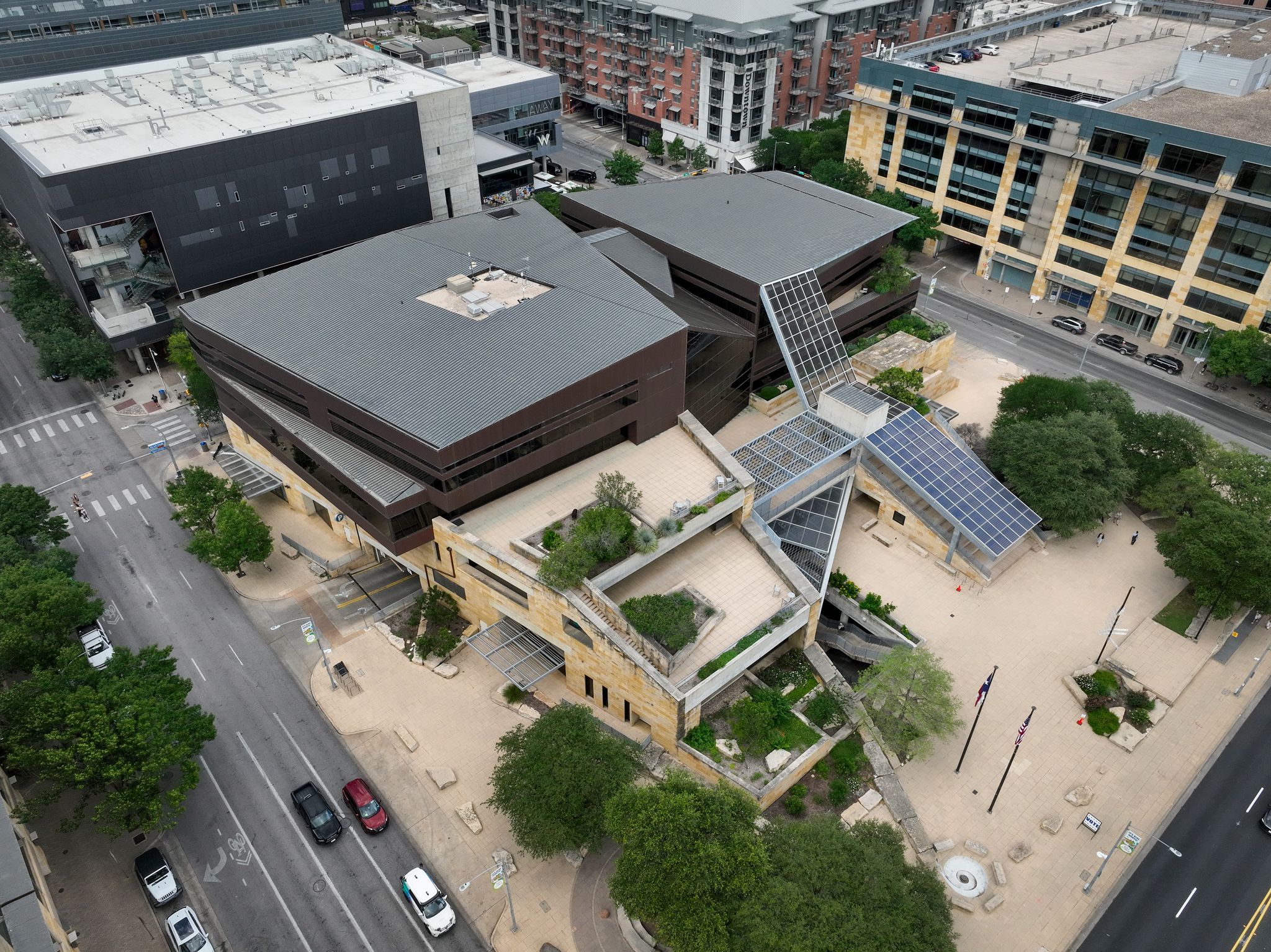 Austin has a lot to say. A new report suggests City Hall could say it cheaper.