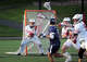 Fairfield Prep goalie Luca Fried, left, defends against Wilton in Fairfield on May 12, 2026.