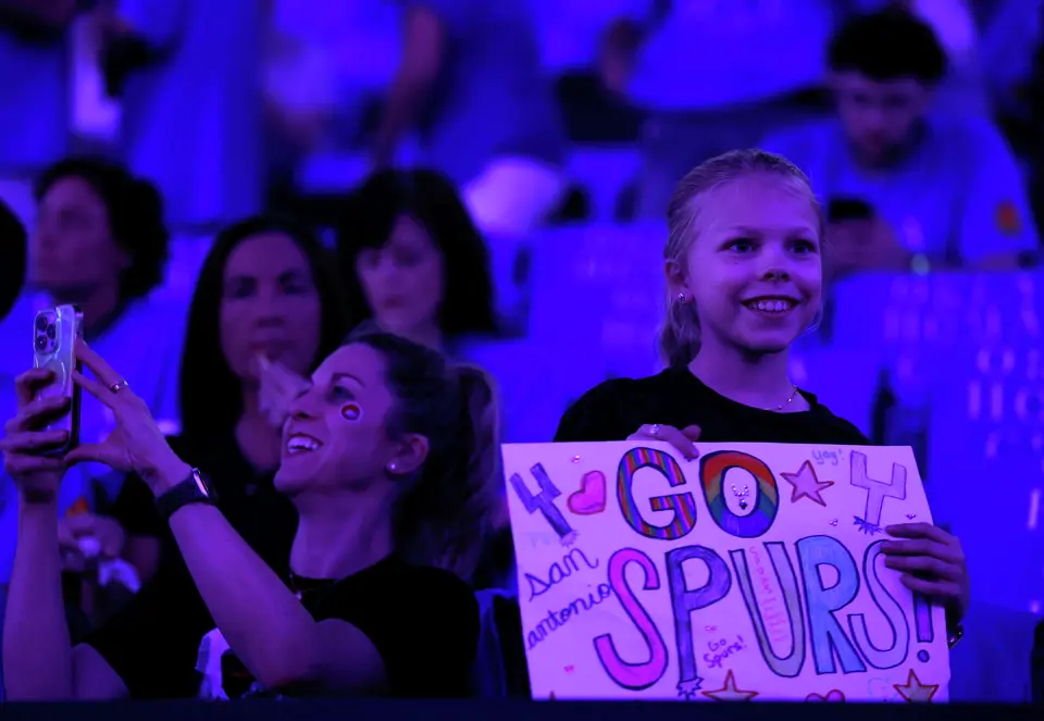 A young Spurs fan watches the team warm up before the start of Game 1 of the Western Conference Finals between the Oklahoma City Thunder and the San Antonio Spurs at Paycom Center in Oklahoma City, Monday, May 18, 2026.
