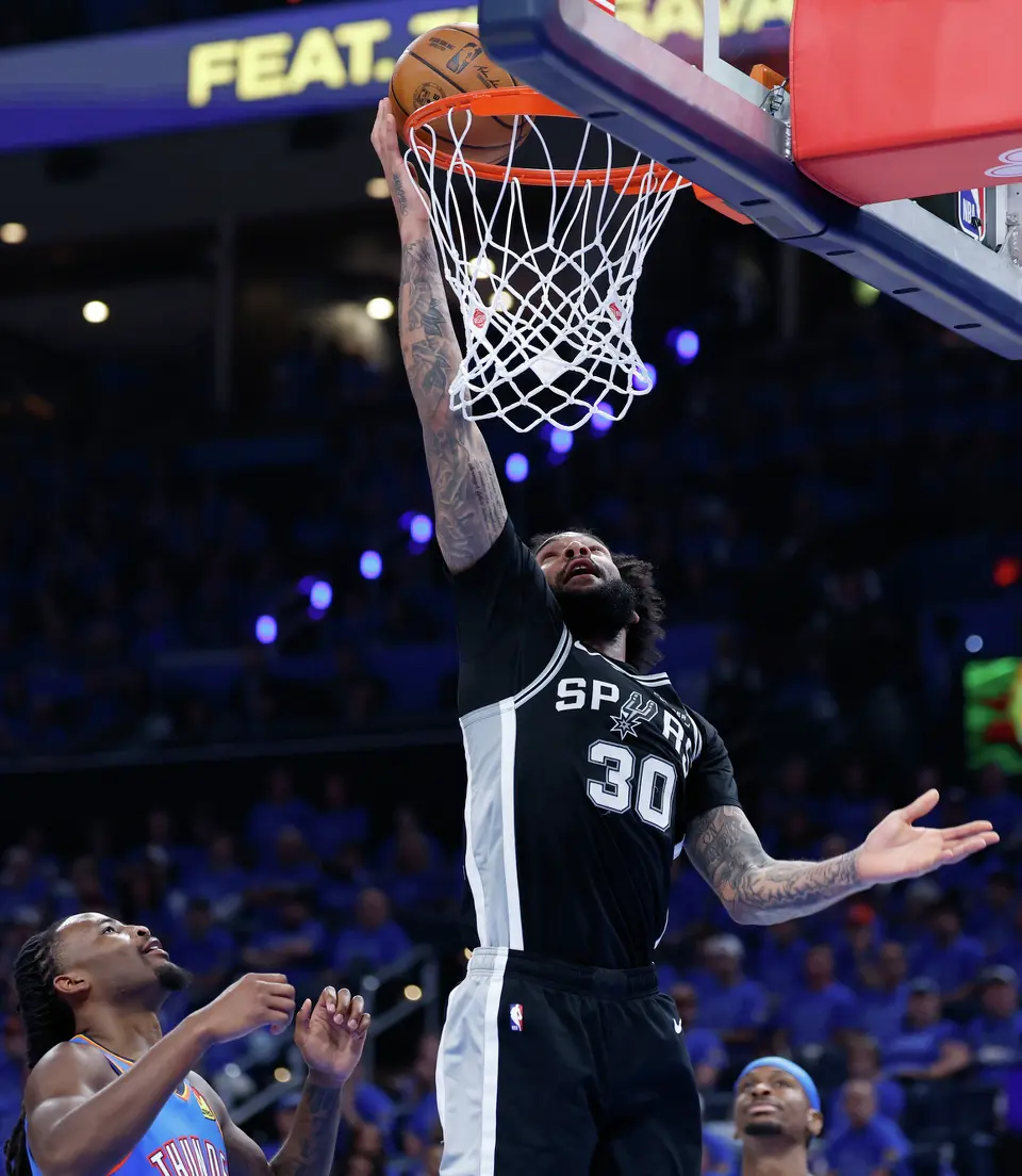 San Antonio Spurs forward Julian Champagnie (30) gets the easy basket during the third quarter of Game 1 of the Western Conference Finals at Paycom Center in Oklahoma City, Monday, May 18, 2026.