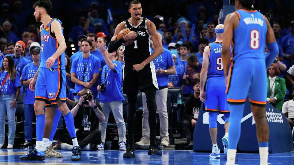 San Antonio Spurs forward Victor Wembanyama (1) celebrates after a dunk during the second overtime of Game 1 in a third-round NBA basketball playoffs series against the Oklahoma City Thunder Monday, May 18, 2026, in Oklahoma City.