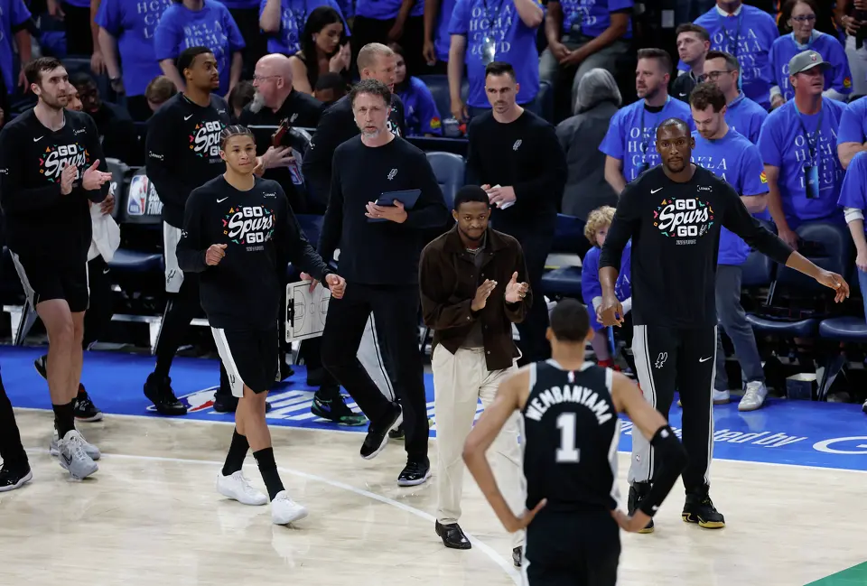 The Spurs bench celebrates a big play by San Antonio Spurs forward Victor Wembanyama (1) as a timeout is called during the second half of Game 1 of the Western Conference Finals at Paycom Center in Oklahoma City, Monday, May 18, 2026. The Spurs defeated the Thunder 122-115 in double overtime.