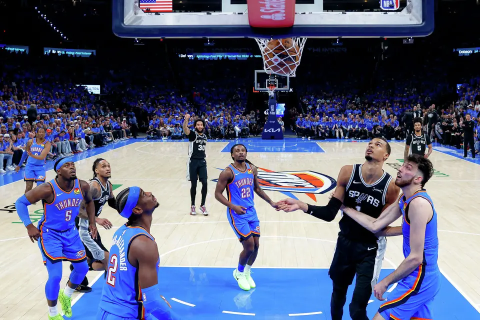 San Antonio Spurs forward Julian Champagnie (30) makes a 3-pointer during Game 1 of the Western Conference Finals at Paycom Center in Oklahoma City, Monday, May 18, 2026. The Spurs defeated the Thunder 122-115 in double overtime.