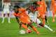 FILE - Ivory Coast's Yan Diomande, left, and Burkina Faso's Issa Kabore challenge during the Africa Cup of Nations best of 16 soccer match between Ivory Coast and Burkina Faso in Marrakech, Morocco, on Jan. 6, 2026.
