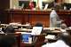 A sign sits on the desk of Democratic South Carolina Rep. Annie McDaniel during the House redistricting debate on Tuesday, May 19, 2026, in Columbia, S.C.