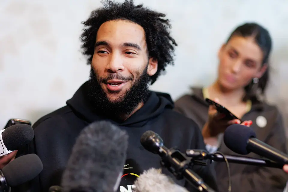 San Antonio Spurs forward Julian Champagnie answers questions during a press conference Tuesday, May 19, 2026, in Oklahoma City, a day after Game 1 of the Western Conference finals against the Oklahoma City Thunder. The Spurs won 122-115 in double overtime to take a 1-0 series lead.