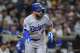 Los Angeles Dodgers' Andy Pages reacts after hitting a sacrifice fly during the ninth inning of a baseball game against the San Diego Padres Tuesday, May 19, 2026, in San Diego.