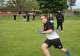Joe Kaczynski of the Golden Knights flag football team runs with the football during practice outside Midland High School on May 18, 2026. Kaczynski is also a state champion sprinter. The Michigan Arsenal arena football team came from Saginaw to practice with the Golden Knights, who are preparing to compete at the Special Olympics USA Games in Minnesota in June.