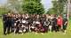 The Golden Knights flag football team and the Michigan Arsenal arena football team join for a picture outside Midland High School on May 18, 2026. The Arsenal came from Saginaw to practice with the Golden Knights, who are preparing to compete at the Special Olympics USA Games in Minnesota in June.