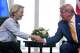 FILE - President Donald Trump and European Commission President Ursula von der Leyen shake hands after reaching a trade deal at the Trump Turnberry golf course in Turnberry, Scotland, on July 27, 2025.