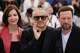 Iris Lebedeva, director Andrey Zvyagintsev and Dmitriy Mazurov pose for photographers at the photo call for the film Minotaur' at the 79th international film festival, Cannes, southern France, Wednesday, May 20, 2026. (Photo by Millie Turner/Invision/AP)