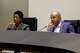 Dallas City Manager Kimberly Bizor Tolbert (left) and Mayor Eric Johnson listen to a presentation about repairs on the aging Dallas City Hall. A reader blames the mayor for downtown's decline.
