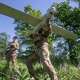 Ukrainian servicemen of Khartia brigade launch a drone towards Russian positions at the front line in the Kharkiv region, Ukraine, Wednesday, May 20, 2026.