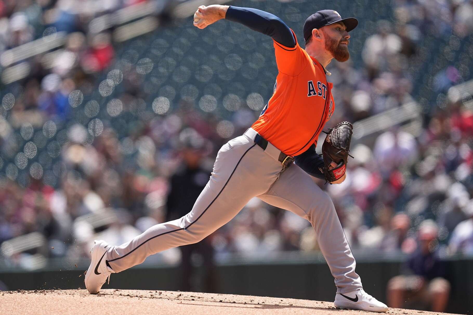 Houston Astros starting pitcher Mike Burrows (50) delivers during the first inning of a baseball game against Minnesota Twins, Wednesday, May 20, 2026, in Minneapolis. (AP Photo/Abbie Parr)