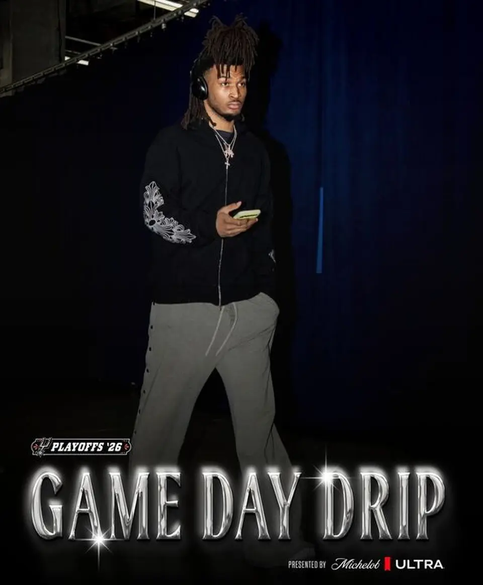 Spurs Stephon Castle arrives at Paycom Center wearing a black Chrome Hearts Zip Up Hoodie and gray snap-button sweatpants before Game 2 against the Oklahoma City Thunder.