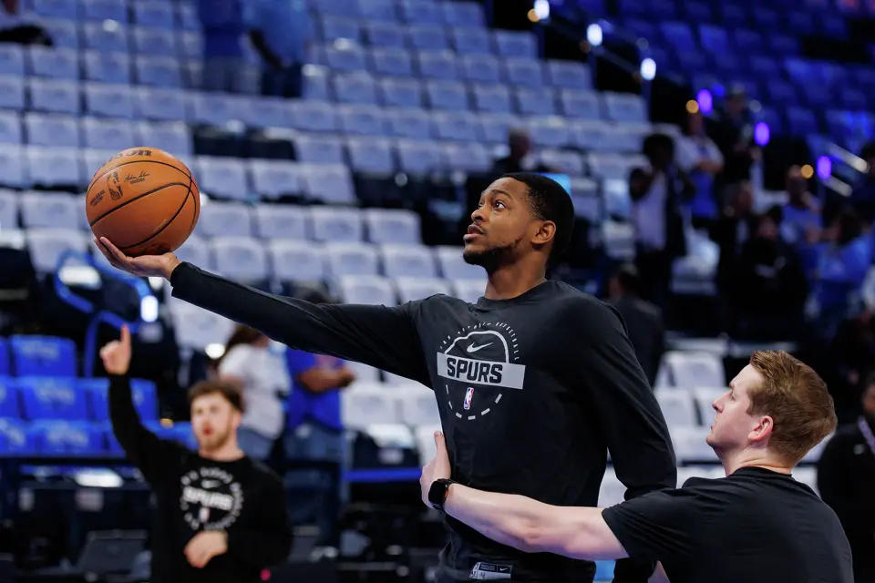 San Antonio Spurs guard De'Aaron Fox warms up before Game 2 of the Western Conference Finals at Paycom Center in Oklahoma City, Wednesday, May 20, 2026. Fox was ruled out after going through pre-game warmups due to a right ankle sprain.