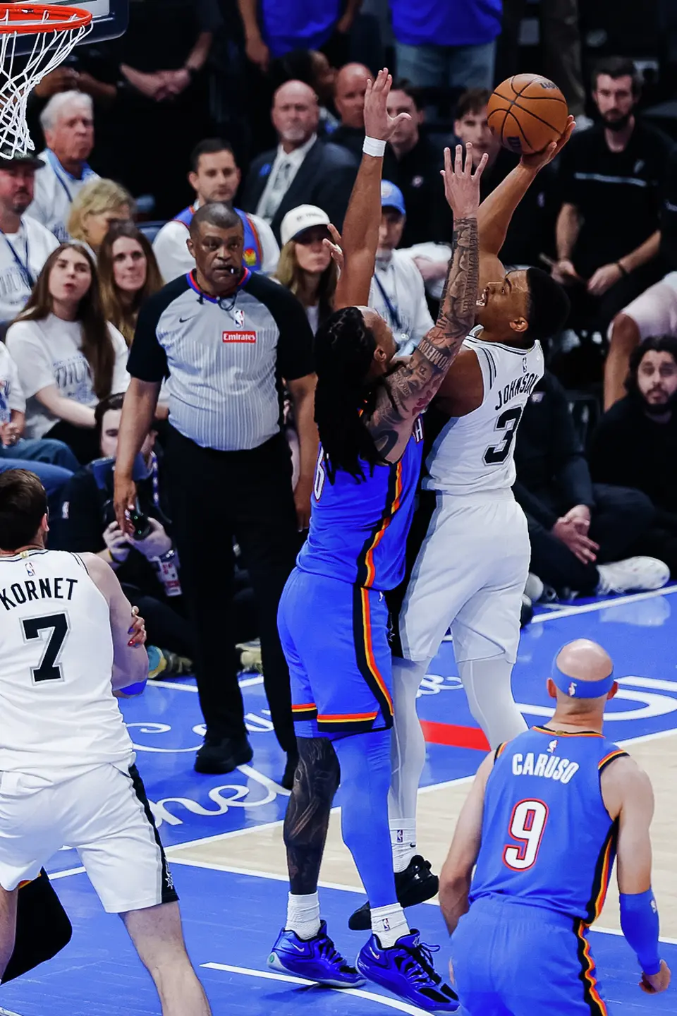 San Antonio Spurs forward Keldon Johnson (3) goes up to shoot a basket during the first half of Game 2 of the Western Conference Finals at Paycom Center in Oklahoma City, Wednesday, May 20, 2026.