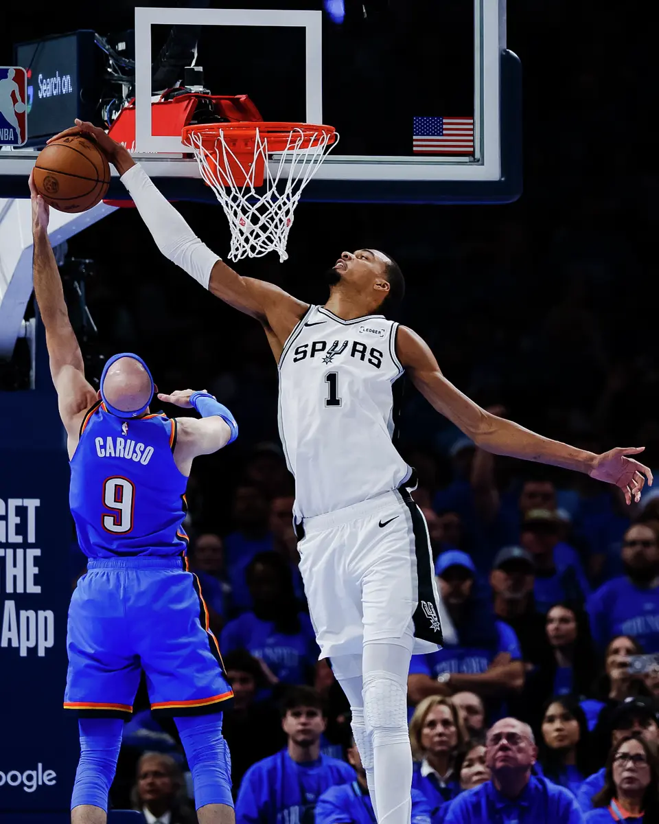 San Antonio Spurs forward Victor Wembanyama (1) blocks a shot by Oklahoma City Thunder guard Alex Caruso (9) during the third quarter of Game 2 of the Western Conference Finals at Paycom Center in Oklahoma City, Wednesday, May 20, 2026.