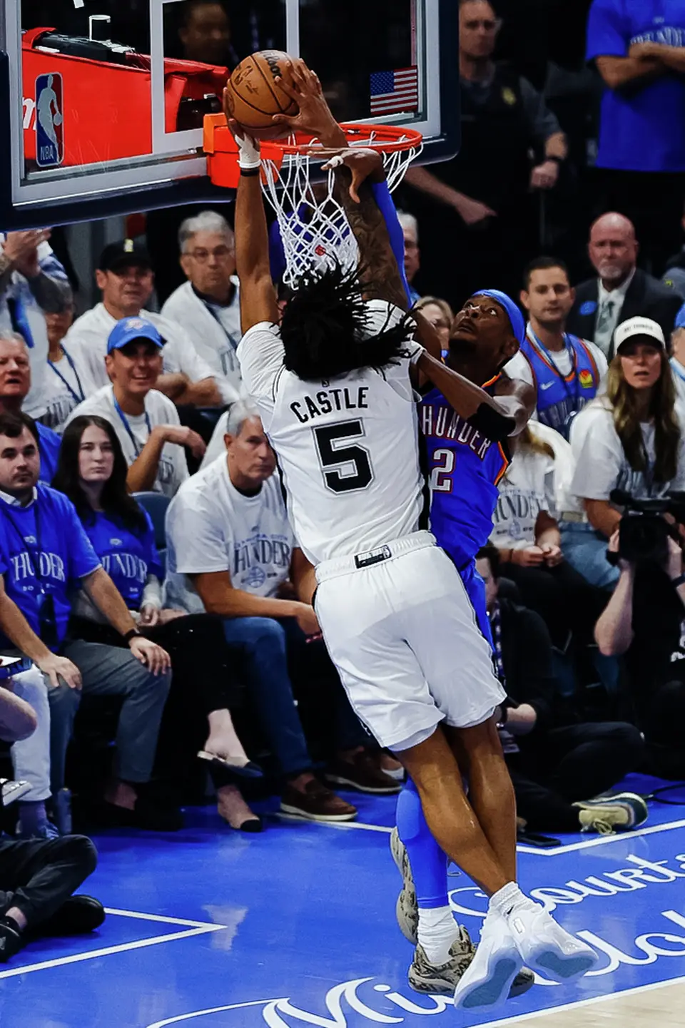 San Antonio Spurs guard Stephon Castle (5) goes up to dunk during the first half of Game 2 of the Western Conference Finals at Paycom Center in Oklahoma City, Wednesday, May 20, 2026.