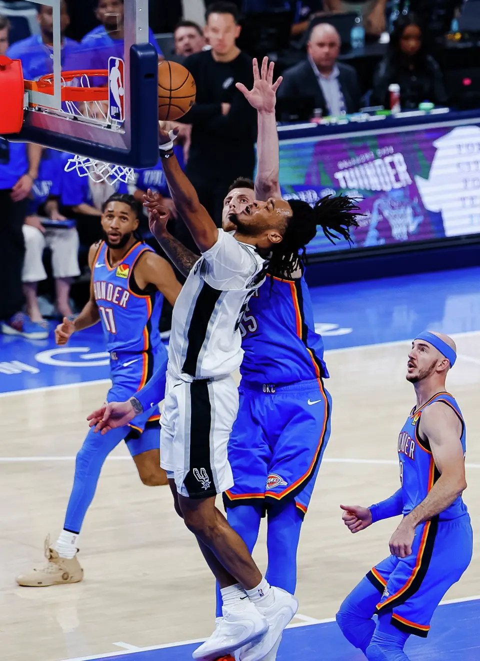 San Antonio Spurs guard Stephon Castle (5) goes up to the basket during the first half of Game 2 of the Western Conference Finals at Paycom Center in Oklahoma City, Wednesday, May 20, 2026.