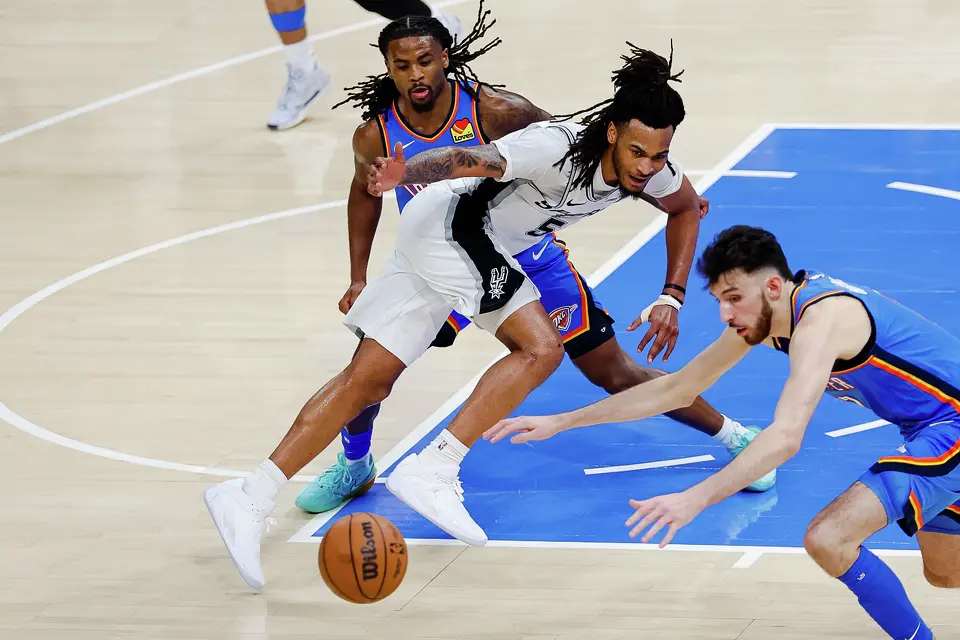 San Antonio Spurs guard Stephon Castle (5) reaches for the ball during the fourth quarter of Game 2 of the Western Conference Finals at Paycom Center in Oklahoma City, Wednesday, May 20, 2026. The San Antonio Spurs fell 122-113 to the Oklahoma City Thunder.