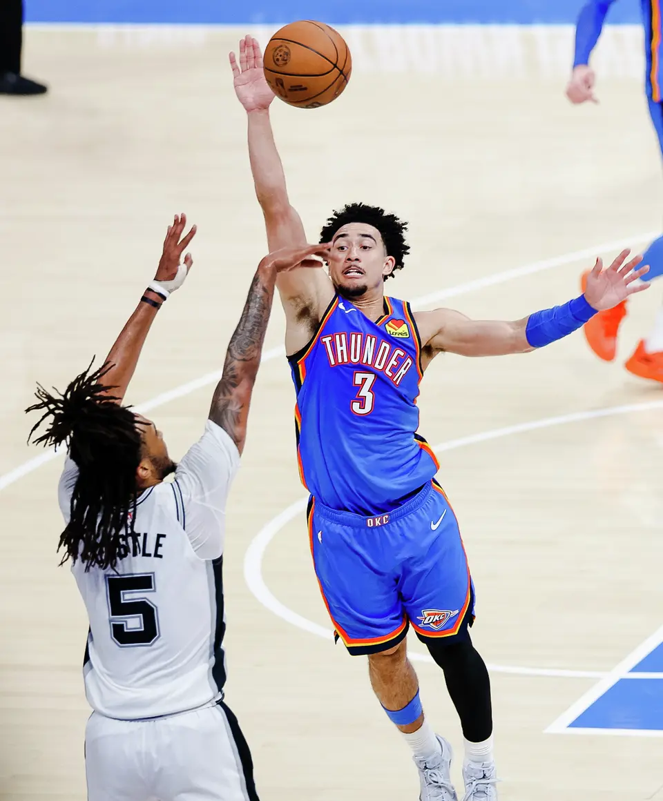 Oklahoma City Thunder guard Jared McCain (3) reaches to block a shot by San Antonio Spurs guard Stephon Castle (5) during the fourth quarter of Game 2 of the Western Conference Finals at Paycom Center in Oklahoma City, Wednesday, May 20, 2026. The San Antonio Spurs fell 122-113 to the Oklahoma City Thunder.