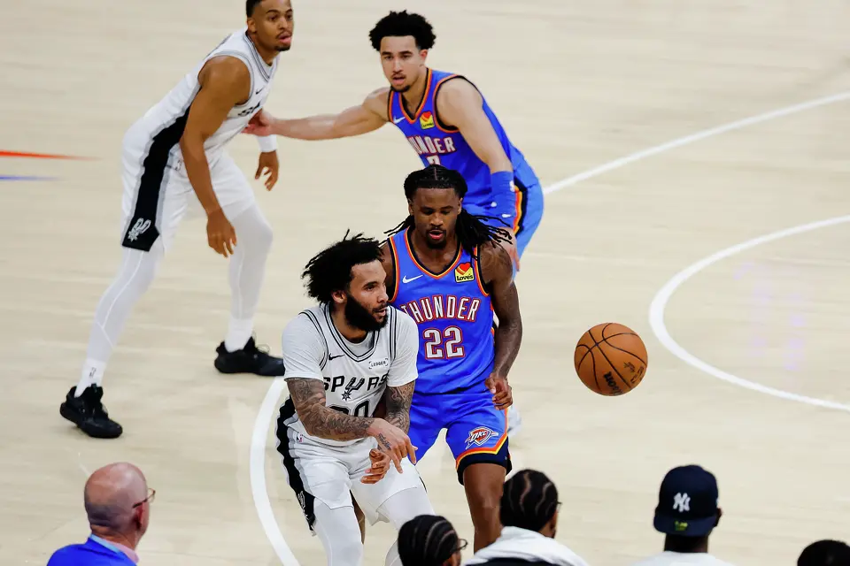 San Antonio Spurs forward Julian Champagnie (30) makes a pass during the fourth quarter of Game 2 of the Western Conference Finals at Paycom Center in Oklahoma City, Wednesday, May 20, 2026. The San Antonio Spurs fell 122-113 to the Oklahoma City Thunder.