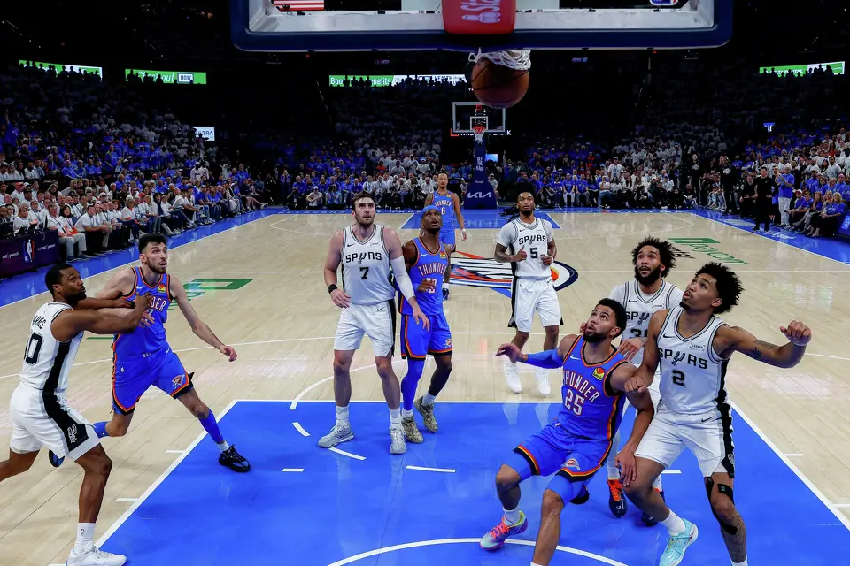The San Antonio Spurs and Oklahoma City Thunder watch a shot from Thunder guard Shai Gilgeous-Alexander (2) go in during Game 2 of the Western Conference Finals at Paycom Center in Oklahoma City, Wednesday, May 20, 2026. The Spurs fell 122-113 to the Thunder.