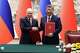 FILE - Russian President Vladimir Putin, left, and Chinese President Xi Jinping shake hands during a signing ceremony at the Great Hall of the People in Beijing, May 20, 2026. (Maxim Shemetov/Pool Photo via AP, File)