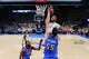San Antonio Spurs guard Stephon Castle (5) dunks against Oklahoma City Thunder center Isaiah Hartenstein (55) during the first half of Game 2 in the Western Conference finals NBA basketball playoffs series Wednesday, May 20, 2026, in Oklahoma City. (AP Photo/Nate Billings)